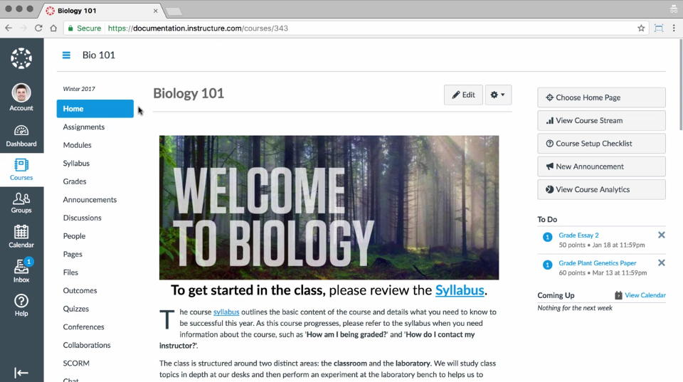 An example home page for a biology class, with a large image of deep woods and with emphasis on a link to the syllabus.
